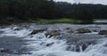 scenic view of pykara waterfall surrounded by lush green forest on the foothills of nilgiri mountains near ooty hill station