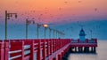 Scenic view red pier with lighthouse at sunrise in Thailand Royalty Free Stock Photo