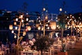 Scenic view of a restaurant next to a river seen during nighttime in Datca, Turkey