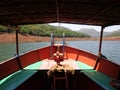 Scenic view of river backwater in hills and mountains greenery