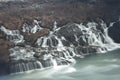 Scenic view of a river cascading over multiple waterfalls with mountains in background in Iceland Royalty Free Stock Photo