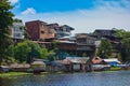 Scenic view of a river passing through a bustling cityscape: Iquitos, Peru, Amazon Royalty Free Stock Photo