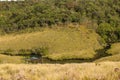 Scenic view of river, rocky mountains covered with green trees Royalty Free Stock Photo