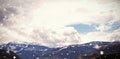 Scenic view of river by snowcapped mountain