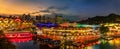 Scenic view of Riverside Point, Clarke Quay with Bumboat cruising in Singapore River