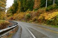 Scenic view of a road in the hills in Western Pennsylvania during autumn on a cloudy day Royalty Free Stock Photo