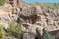 Armenia, Geghard, September 2021. Ancient Armenian khachkars on the rocks near the old monastery. Royalty Free Stock Photo