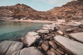 Scenic view of the rocky coast of Paros Island, Greece on a bright sunny day