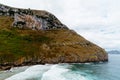 Scenic view of rocky promontory in the coast. Sonabia Beach in Cantabria