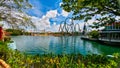 Scenic view of roller coaster rides across the blue lake in Florida Universal studios