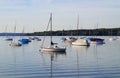 a scenic view of sailing boats in the evening sun in Herrsching on lake Ammersee in Germany Royalty Free Stock Photo