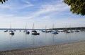 a scenic view of sailing boats in the evening sun on lake Ammersee in Germany Royalty Free Stock Photo