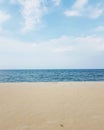 Scenic view of sandy beach against blue sky Royalty Free Stock Photo