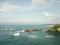 Scenic view of the ocean against blue sky in Galle, Sri Lanka Royalty Free Stock Photo