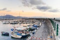 Scenic view of the sea and boats in the port at sunset, on background Sorrento peninsula in Torre del Greco near Naples