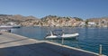 Scenic view of the sea surface of Symi , Greece. Ships and yachts in the bay of the island on the Aegean Sea. Royalty Free Stock Photo