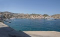 Scenic view of the sea surface of Symi , Greece. Ships and yachts in the bay of the island on the Aegean Sea. Royalty Free Stock Photo