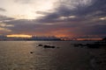 Scenic View Of Seascape Against Sky During Sunset