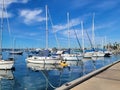 Scenic view of several yachts at San Diego Bay in wintertime on a bright, sunny day