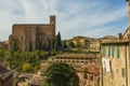 Scenic view of Siena cityscape over rooftops with San Domenico Basilica Royalty Free Stock Photo