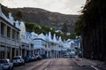 Scenic view of Simons Town in South Africa with multiple cars parked along the road