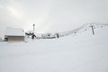 Scenic view of ski lift with over the mountain in ski resort. Royalty Free Stock Photo