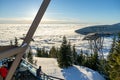 A scenic view of Skyride Gondola at The Peak of Vancouver above the White Puffy Clouds at sunset. Attitudes bistro lookout Royalty Free Stock Photo