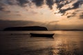 Scenic view of small fishing boat in calm water Royalty Free Stock Photo