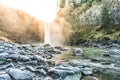 Scenic view of Snoqualmie falls with golden fog when sunrise in the morning. Royalty Free Stock Photo