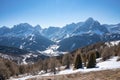 Scenic view of snowy kronplatz mountain and trees against sky Royalty Free Stock Photo