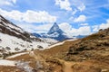 Scenic view on snowy Matterhorn mountain peak in sunny day with blue sky in Switzerland. Beautiful nature background of Swiss Alps Royalty Free Stock Photo