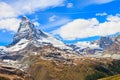 Scenic view on snowy Matterhorn mountain peak in sunny day with blue sky in Switzerland. Beautiful nature background of Swiss Alps Royalty Free Stock Photo