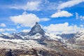 Scenic view on snowy Matterhorn mountain peak in sunny day with blue sky in Switzerland. Beautiful nature background of Swiss Alps Royalty Free Stock Photo