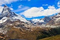 Scenic view on snowy Matterhorn mountain peak in sunny day with blue sky in Switzerland. Royalty Free Stock Photo