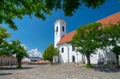 Scenic view of St. John Catholic parish church in old town of Szentendre, Hungary at sunny summer day Royalty Free Stock Photo