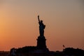 Scenic view at Statue of Liberty at a sunset Royalty Free Stock Photo