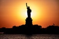 Scenic view of Statue of Liberty at a sunset. Royalty Free Stock Photo