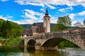 Scenic view of stone bridge and church of St John the Baptist on Bohinj Lake, Slovenia Royalty Free Stock Photo