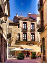 Scenic view of a street in Ciudad Rodrigo, Spain with tall buildings