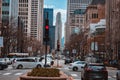 Scenic view of the streets of Chicago filled with people and cars during the day