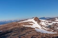 Scenic view on summit cross of mountain peak Gertrusk seen from Ladinger Spitz, Saualpe, Carinthia, Austria. After sunrise Royalty Free Stock Photo