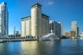 Scenic view on a sunny day with blue skies with water reflections on Office buildings, skyscrapers, River Thames, yacht, marina Royalty Free Stock Photo