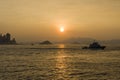 Sunset over the ocean. Scenic view during sunset from West Kowloon Waterfront Promenade. Eye Level View