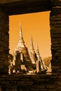 Scenic View The Three Ancient Buddhist Chedis of Wat Phra Si Sanphet in The Historic City of Ayutthaya Thailand through the Window Royalty Free Stock Photo