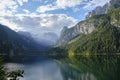 Scenic view towards Dachstein Mountains, at lake Gosau Vorderer Gosausee, Austria, in the Summer. Hiking, trekking, tourism. Royalty Free Stock Photo