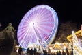 Scenic view of traditional old german Christmas market square in Magdeburg with light decoration illuminated ferris Royalty Free Stock Photo