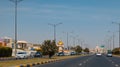 Scenic view of traffic driving along a busy highway in Sharjah, United Arab Emirates.