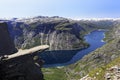 Scenic view of Trolltunga the famous Troll`s tongue Norwegian destination and Ringedalsvatnet Lake in Odda, Norway