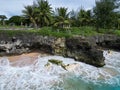 Scenic view of a tropical beach against the sea in Tinian