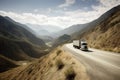 A scenic view of a truck driving through mountains: The image show a transport truck driving through a winding road in the